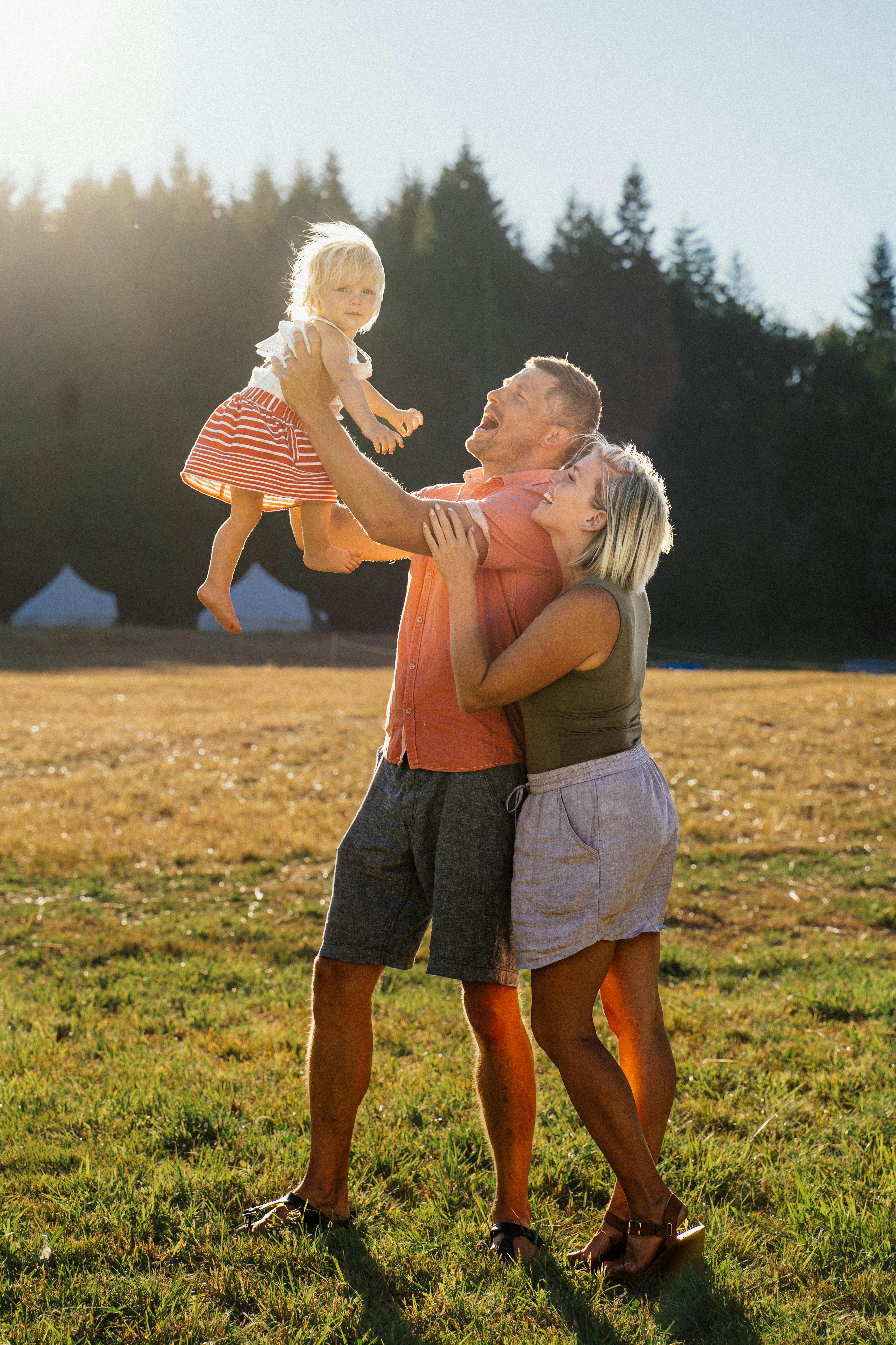 Mom and dad with baby girl.